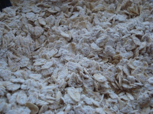 Rolled oats coated with all-purpose and whole wheat flour and baking soda